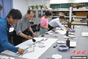天天吉历两岸艺术家在安徽“共绘一幅画”